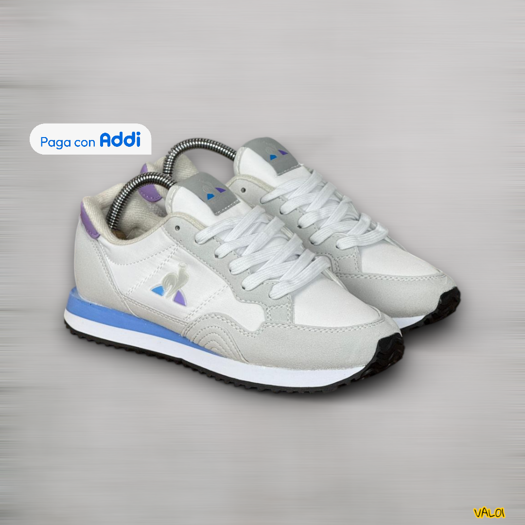 Tenis Le Coq Sportif grises calidad importada 1.1 con suela ligera y cómoda.