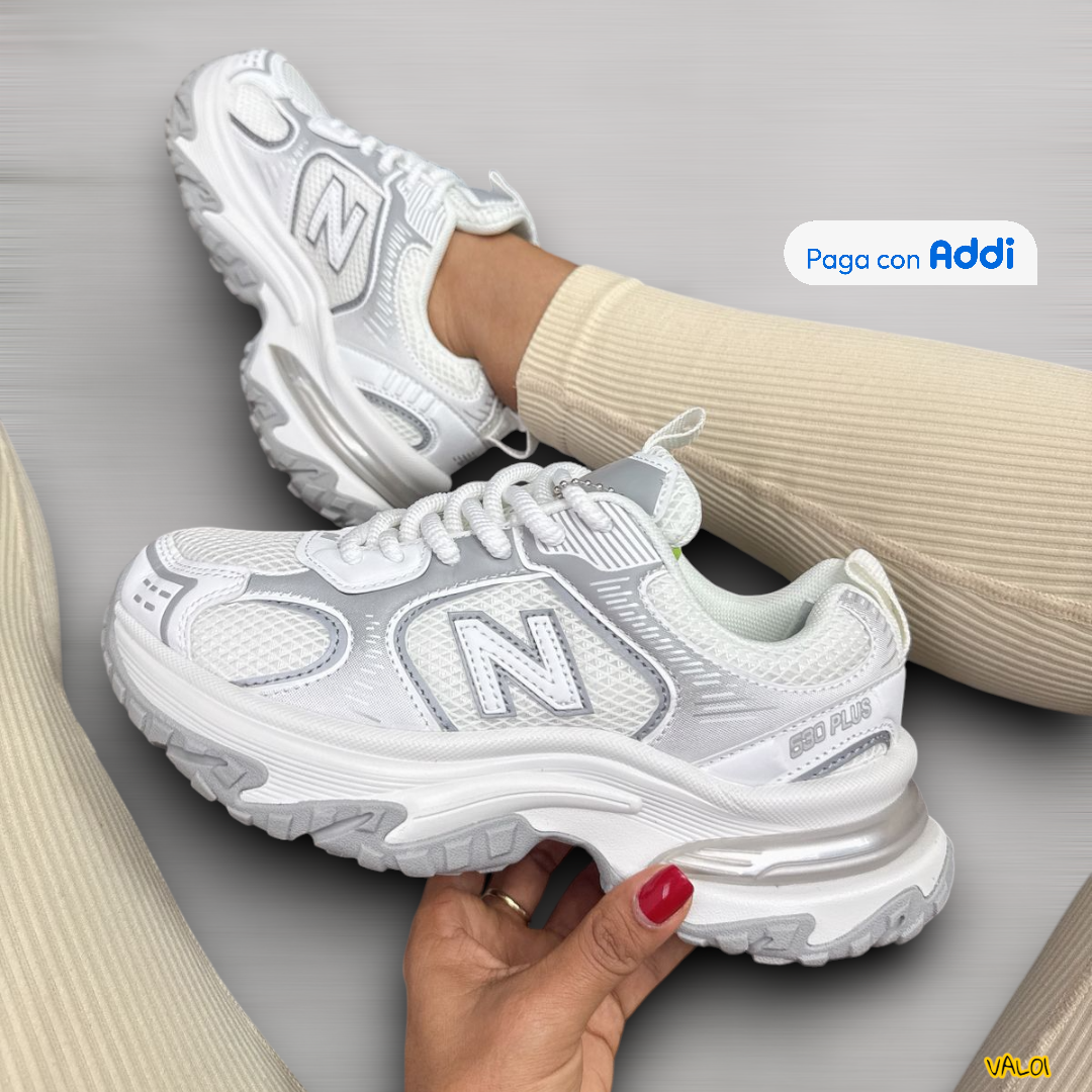 New Balance 530 Plus tenis lifestyle blanco con detalles plateados