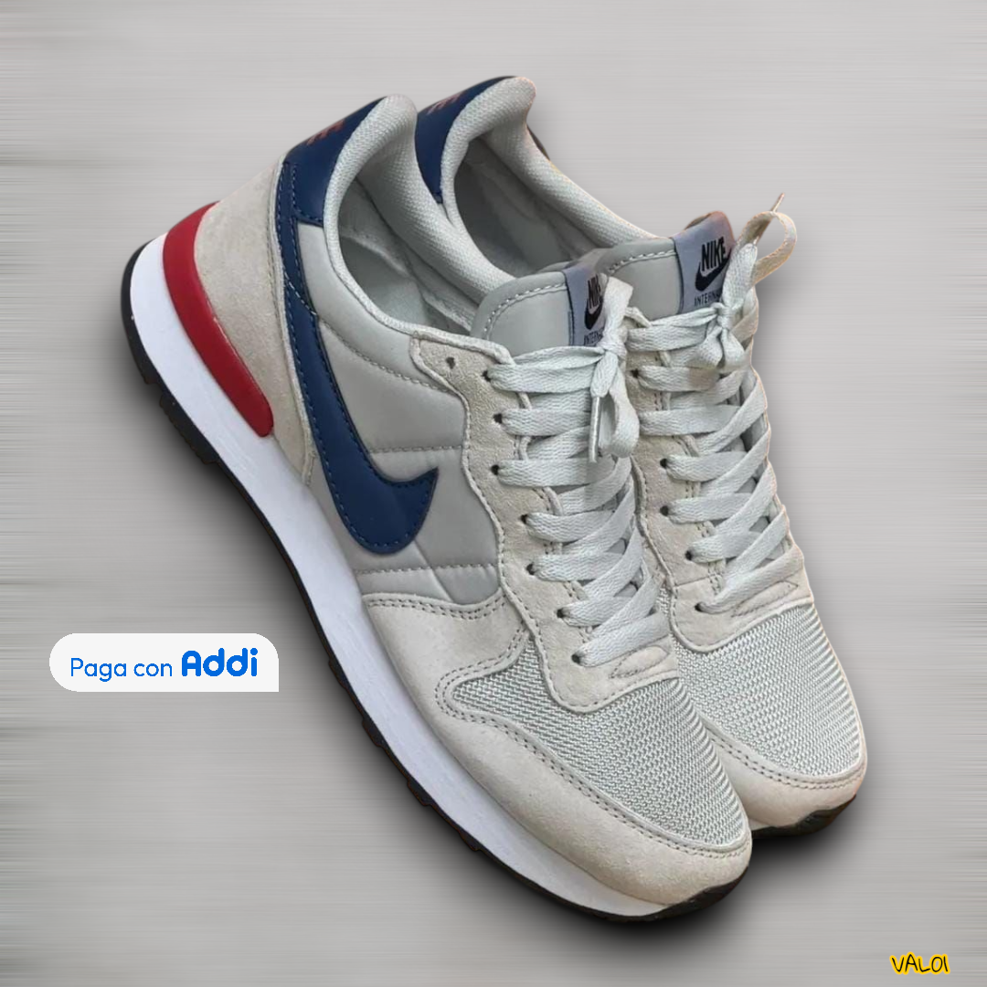 Calzado deportivo Nike International color gris calidad importada 1.1 cómodo y versátil.