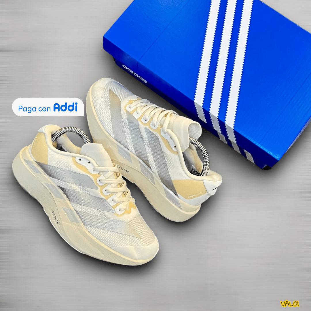Tenis Adidas Adizero blanco con detalles plateados premium