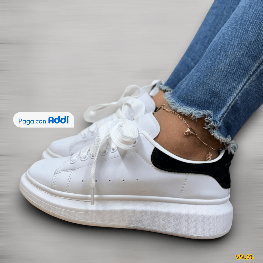 Tenis Alexander McQueen blanco negro estilo sofisticado urbano