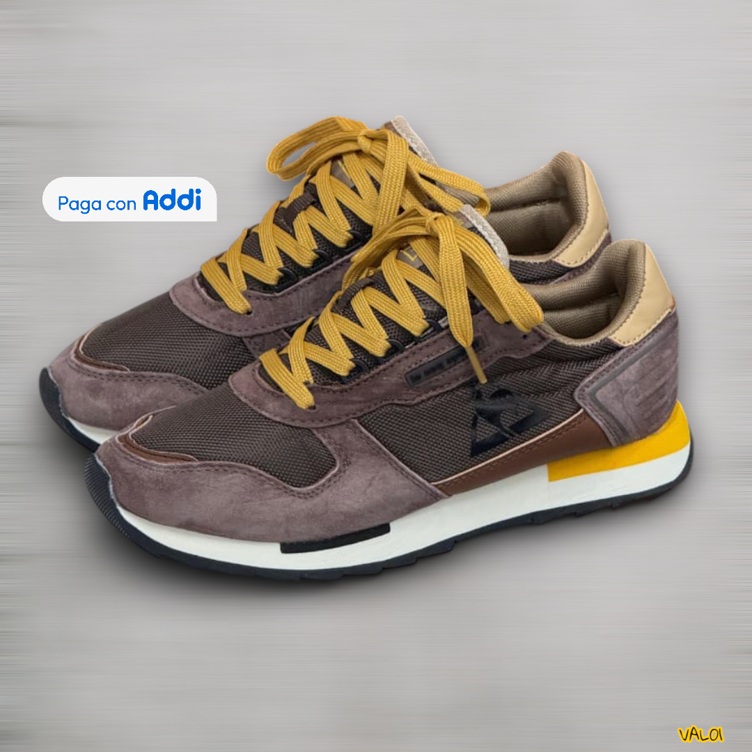 Tenis Le Coq Sportif café amarillo look clásico contemporáneo