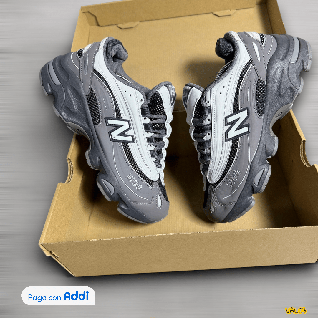 Tenis New Balance 1000 gris blanco estilo urbano retro running diseño moderno calidad 1.1