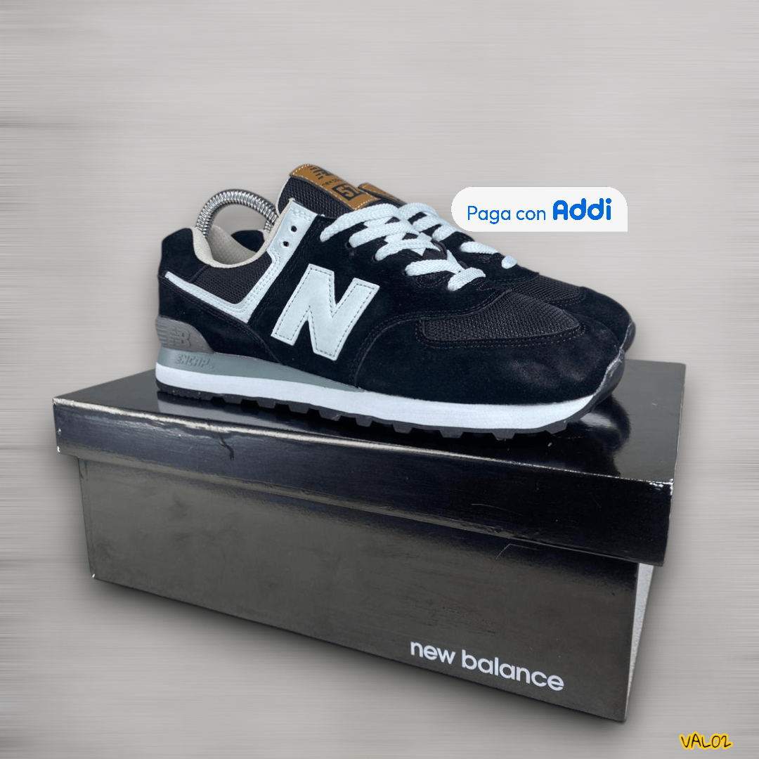 Tenis New Balance 574 negro blanco combinación clásica moderna
