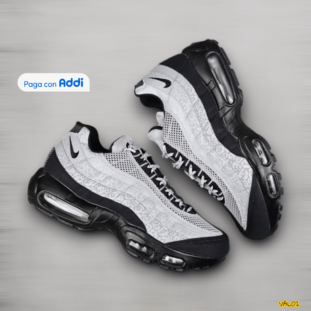 Tenis Nike 7 Cámaras negro plateado diseño urbano moderno