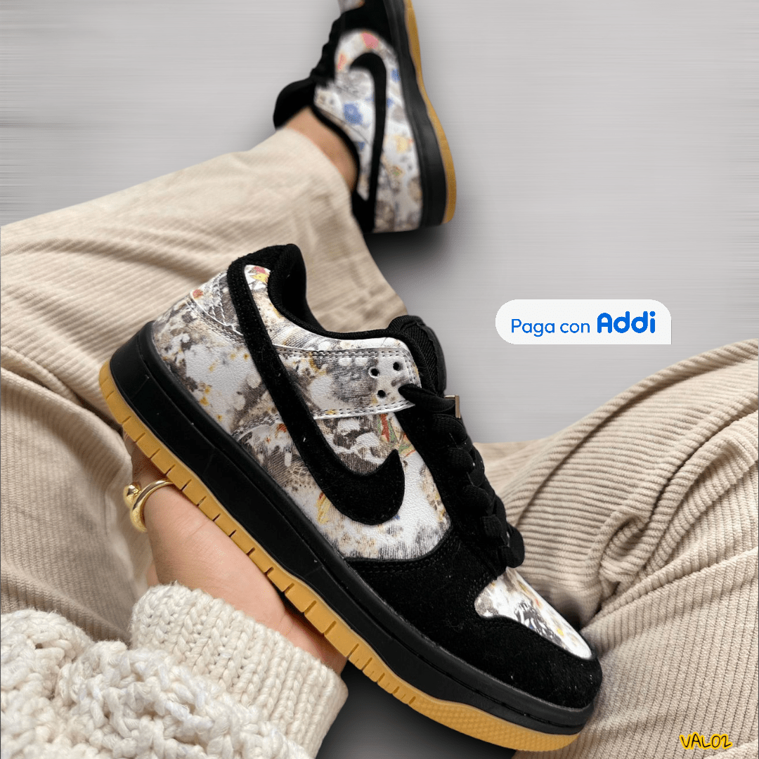 Tenis Nike SB negro blanco grafitis estilo skate urbano llamativo