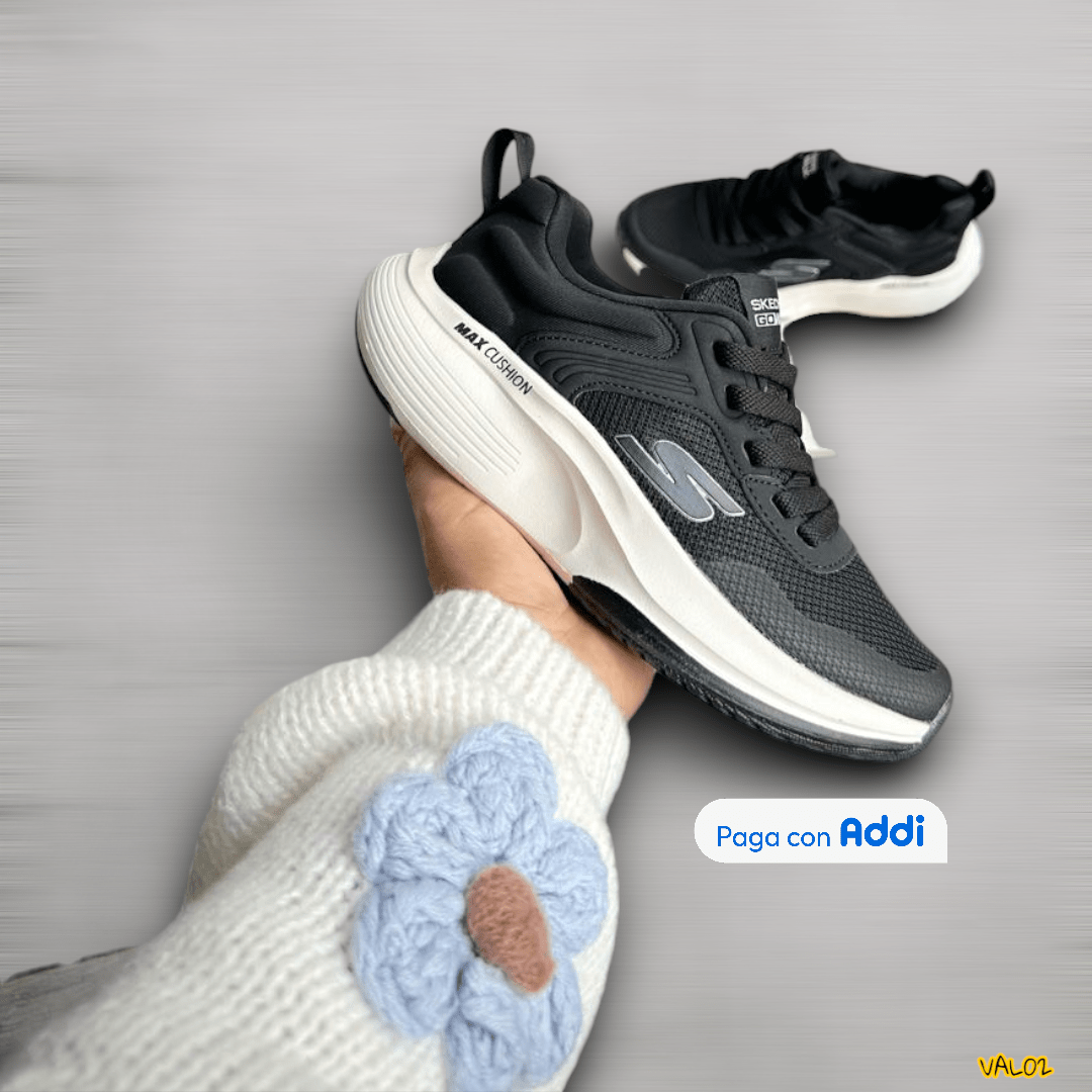 Tenis Skechers Max Cushion negro blanco estilo deportivo versátil