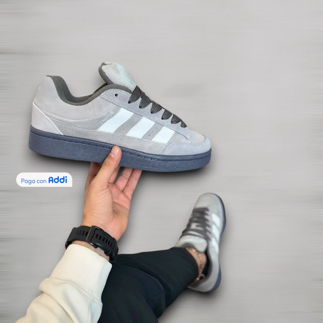 Tenis Adidas Campus hombre gris blanco estilo casual urbano para caminar con diseño clásico y comodidad