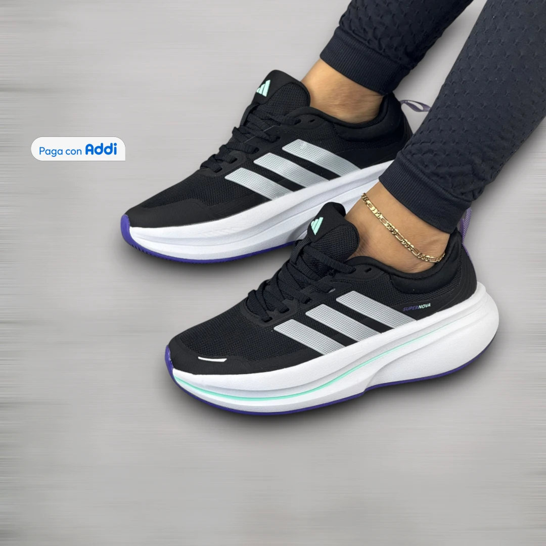 Tenis Adidas Supernova mujer negro blanco para running y caminatas, con soporte deportivo, amortiguación y ajuste confortable