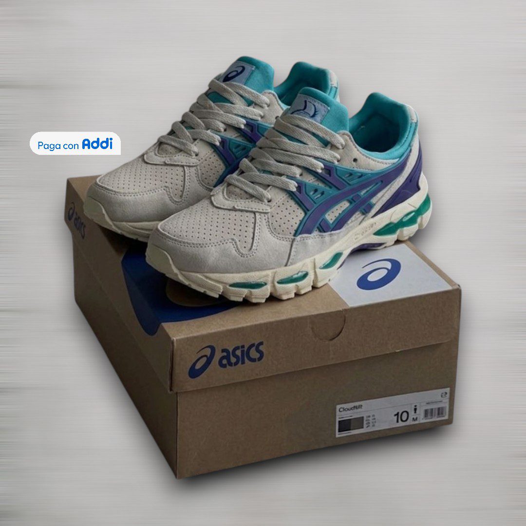 Los tenis Asics Kayano 21 calidad 1.1 combinan tonos beige y azul con un estilo retro running en tendencia. Diseño cómodo, excelente ajuste y materiales resistentes para quienes buscan confort y estilo urbano premium.