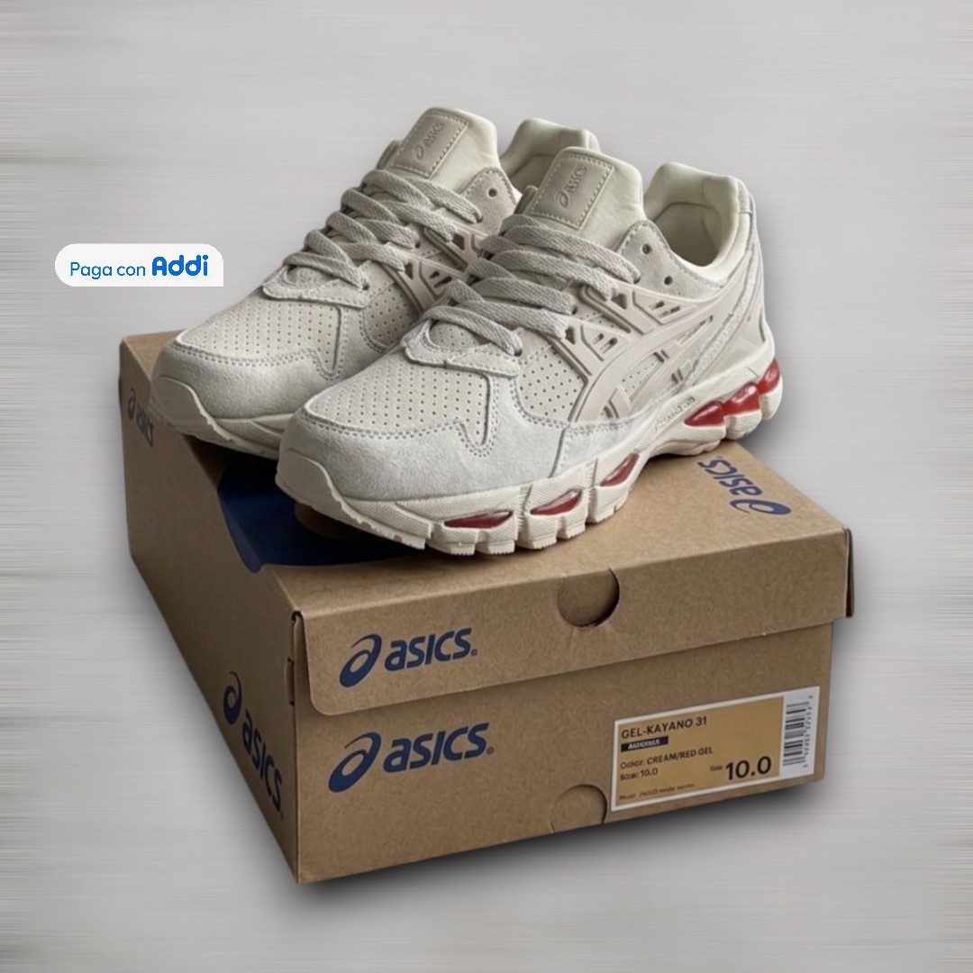Tenis Asics Kayano 21 calidad 1.1 en tono gris con diseño moderno y minimalista. Ideales para quienes buscan comodidad, estilo urbano y versatilidad en cualquier ocasión.