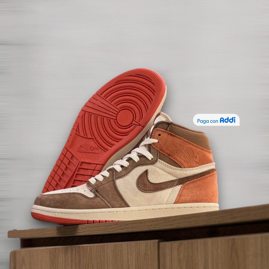 Tenis Bota Jordan Retro 1 calidad 1.1 blanco con naranja de estilo deportivo urbano y detalles premium. Excelente ajuste, comodidad diaria y diseño versátil para cualquier ocasión.