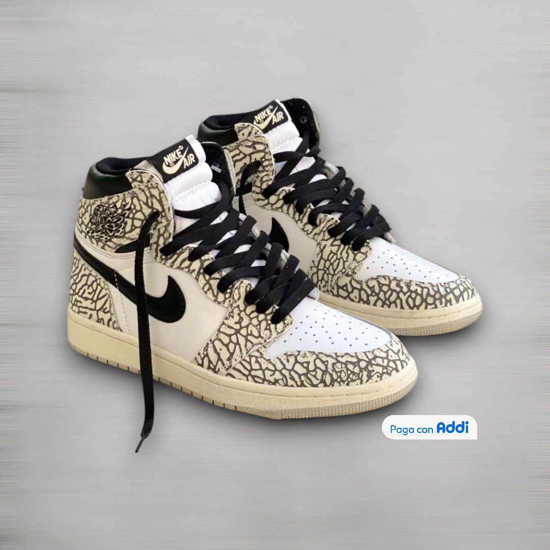 Los tenis Bota Jordan Retro 1 calidad 1.1 blancos con puntos negros ofrecen una combinación sobria y versátil inspirada en la tendencia streetwear. Comodidad, durabilidad y diseño icónico en un solo modelo.