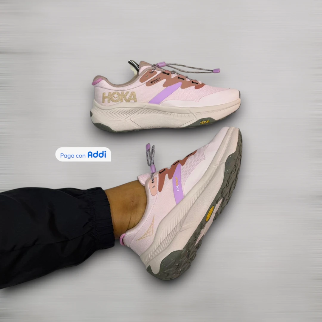 Tenis Hoka rosa estilo running para entrenamiento con amortiguación premium y diseño deportivo