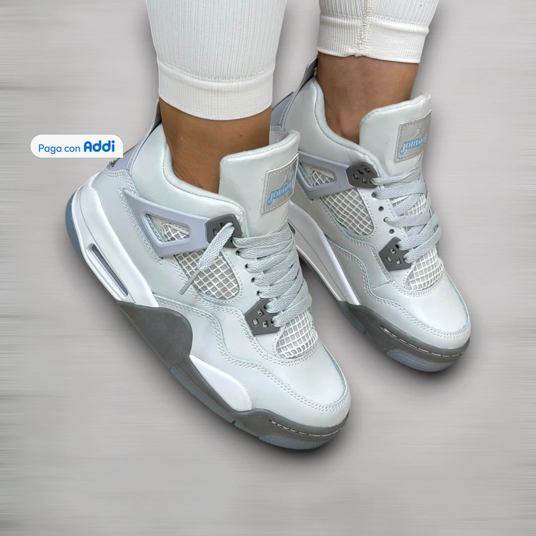 Tenis Jordan Retro 4 mujer gris estilo deportivo retro, con silueta llamativa, soporte firme y comodidad para uso diario