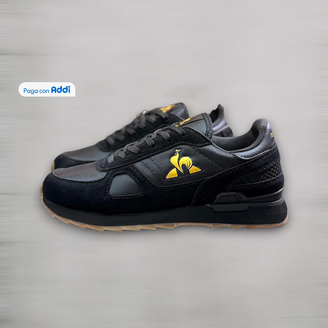 ALT: Le Coq Sportif tenis negro dorado lifestyle elegante urbano calidad 1.1 acabado premium