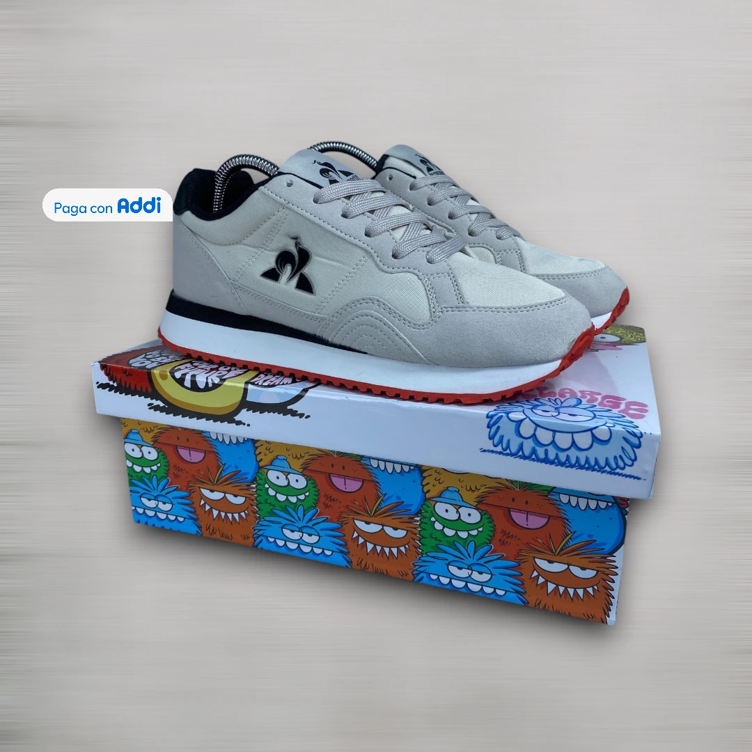 Tenis Le Coq Sportif gris negro estilo casual urbano para uso diario con comodidad superior y diseño deportivo