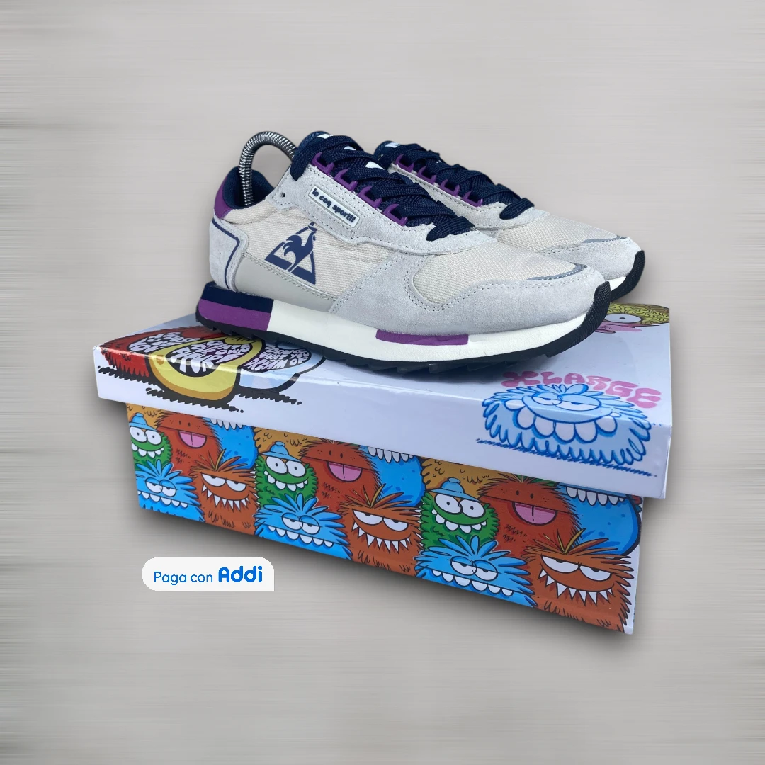 Tenis Le Coq Sportif gris morado para caminar con estilo deportivo casual y suela cómoda