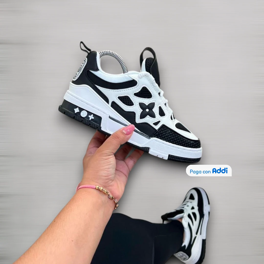 Tenis Louis Vuitton blanco negro estilo urbano de lujo para caminar con diseño exclusivo y comodidad premium