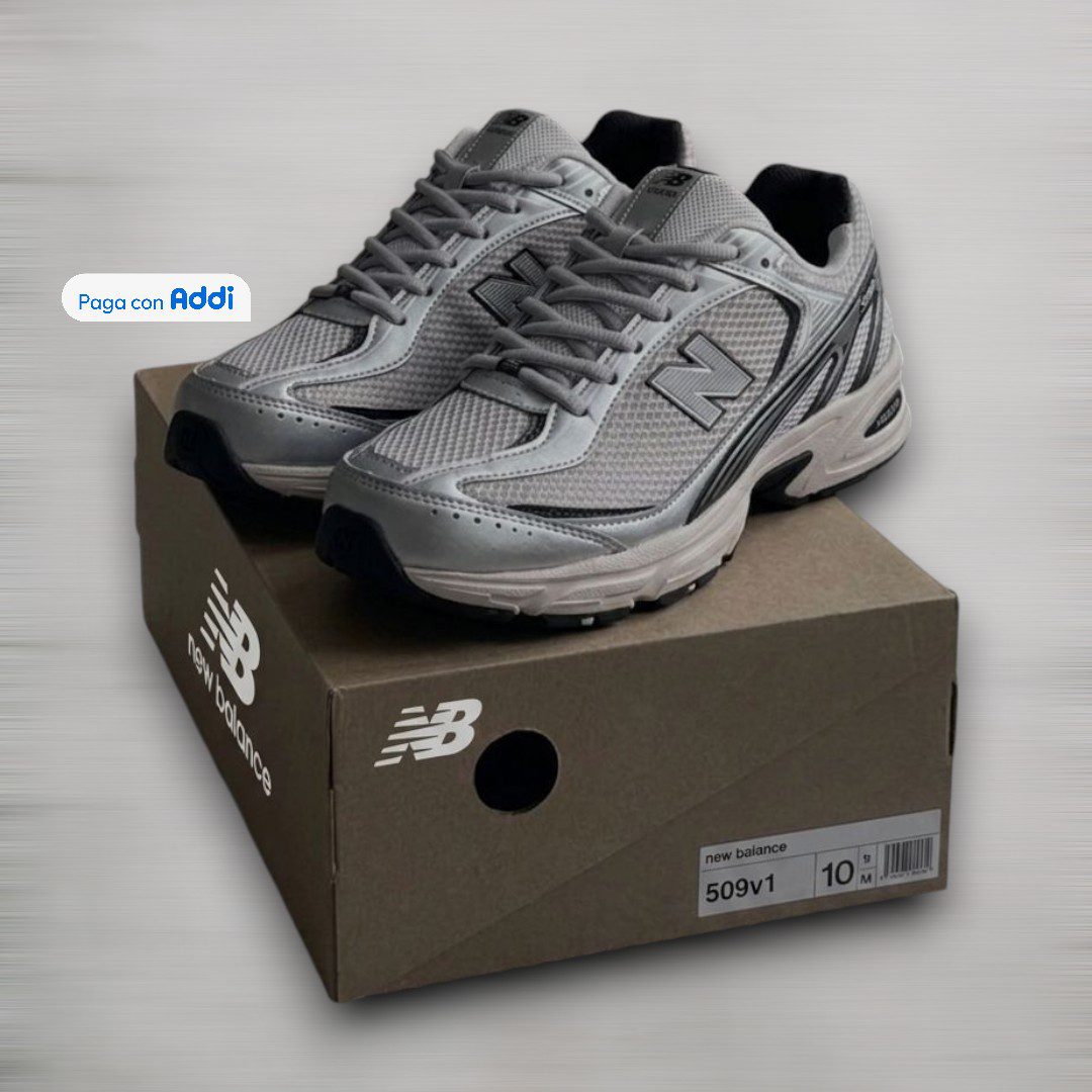 Tenis New Balance 509 calidad 1.1 gris con negro, ideales para quienes buscan un diseño deportivo moderno con acabados premium. Excelente ajuste, comodidad y estilo urbano versátil.