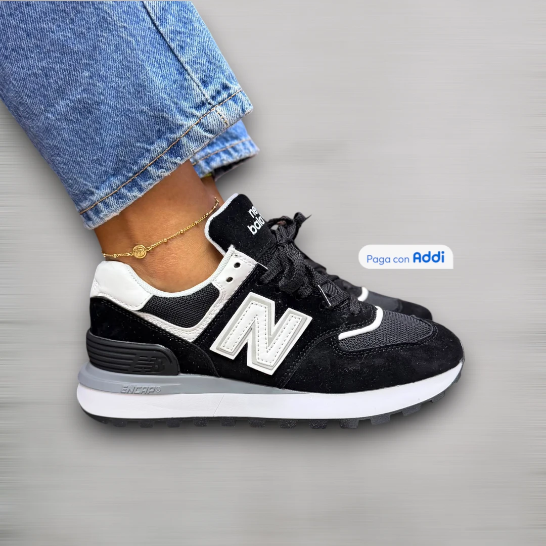 Tenis New Balance 574 mujer negro blanco con inspiración deportiva vintage, plantilla confortable y excelente versatilidad urbana