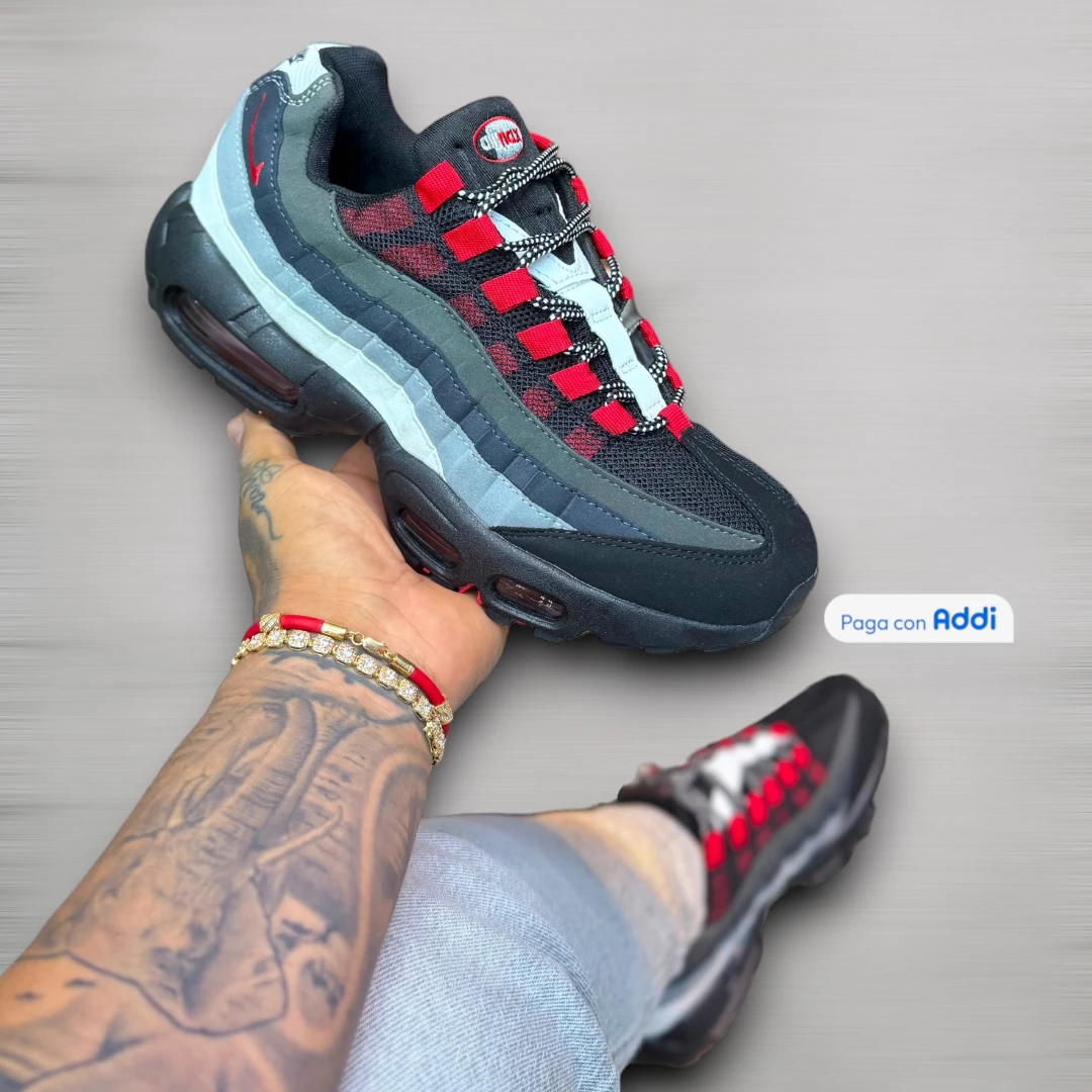 Tenis Nike 7 Cámaras hombre negro gris con diseño tecnológico deportivo, amortiguación estructurada y pisada segura