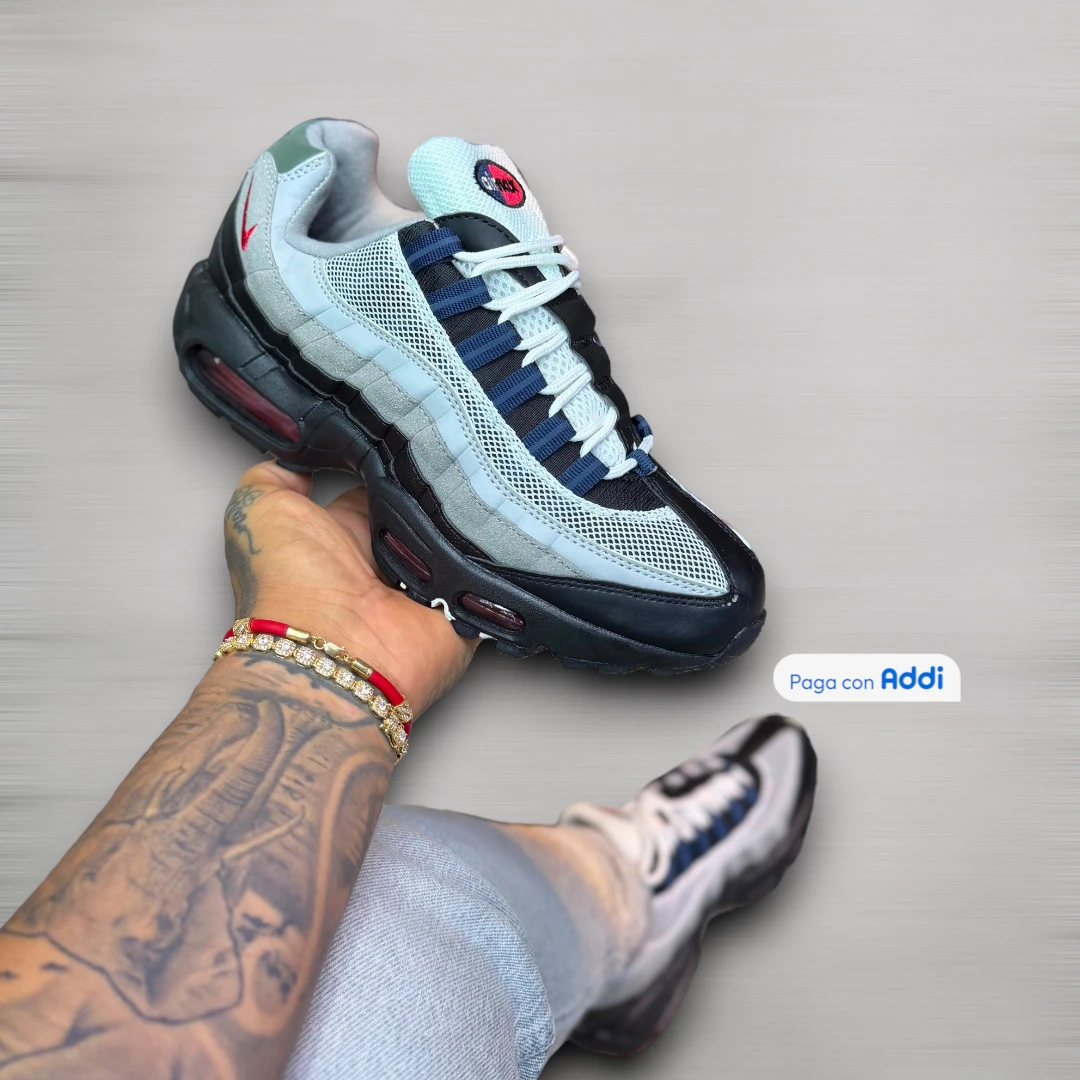 Tenis Nike 7 Cámaras hombre gris negro rojo con estructura deportiva multicámara, soporte firme y comodidad para uso cotidiano