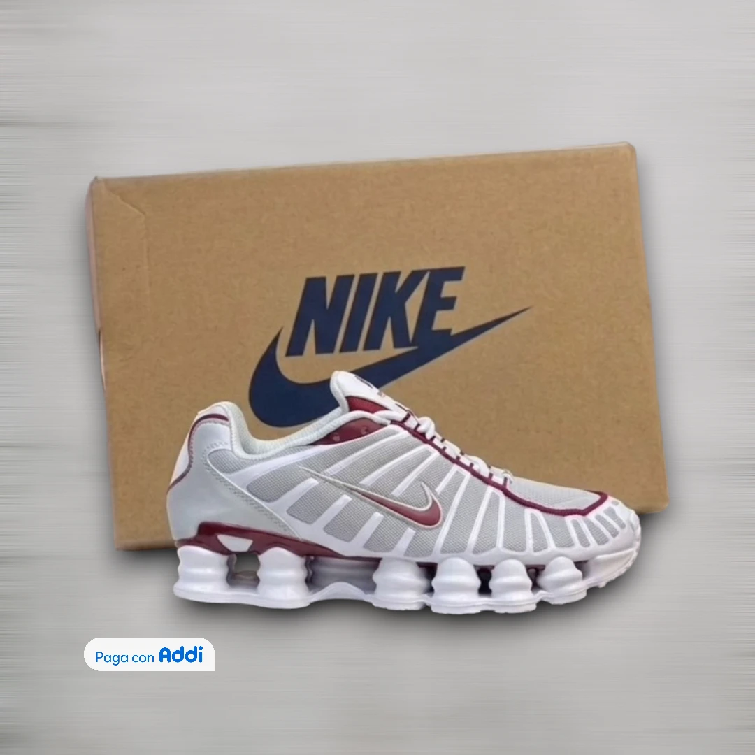 Tenis running Nike Gusano blanco plateado y rojo para caminar con diseño moderno urbano