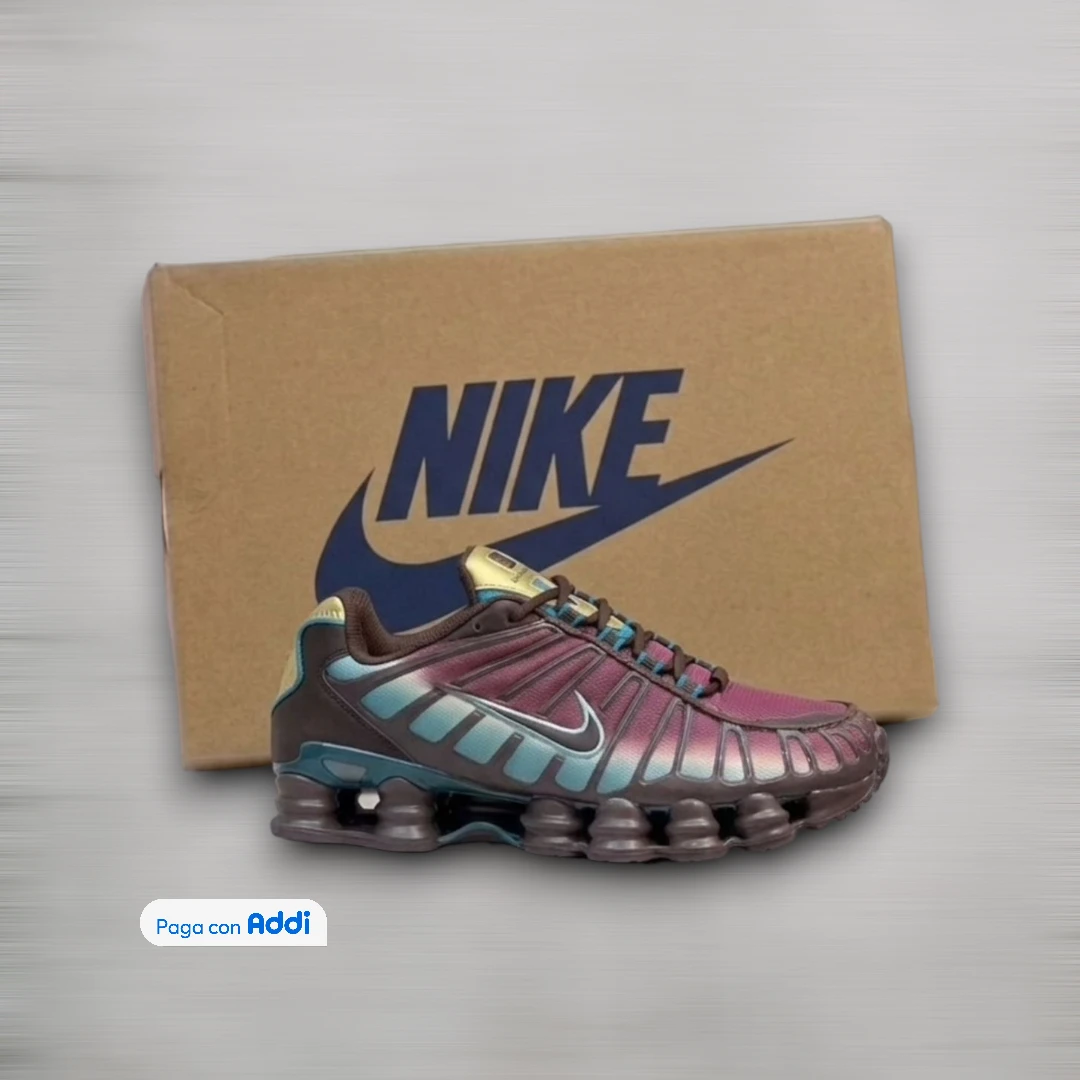 Tenis urbanos Nike Gusano azul negro y blanco con diseño deportivo moderno y amortiguación