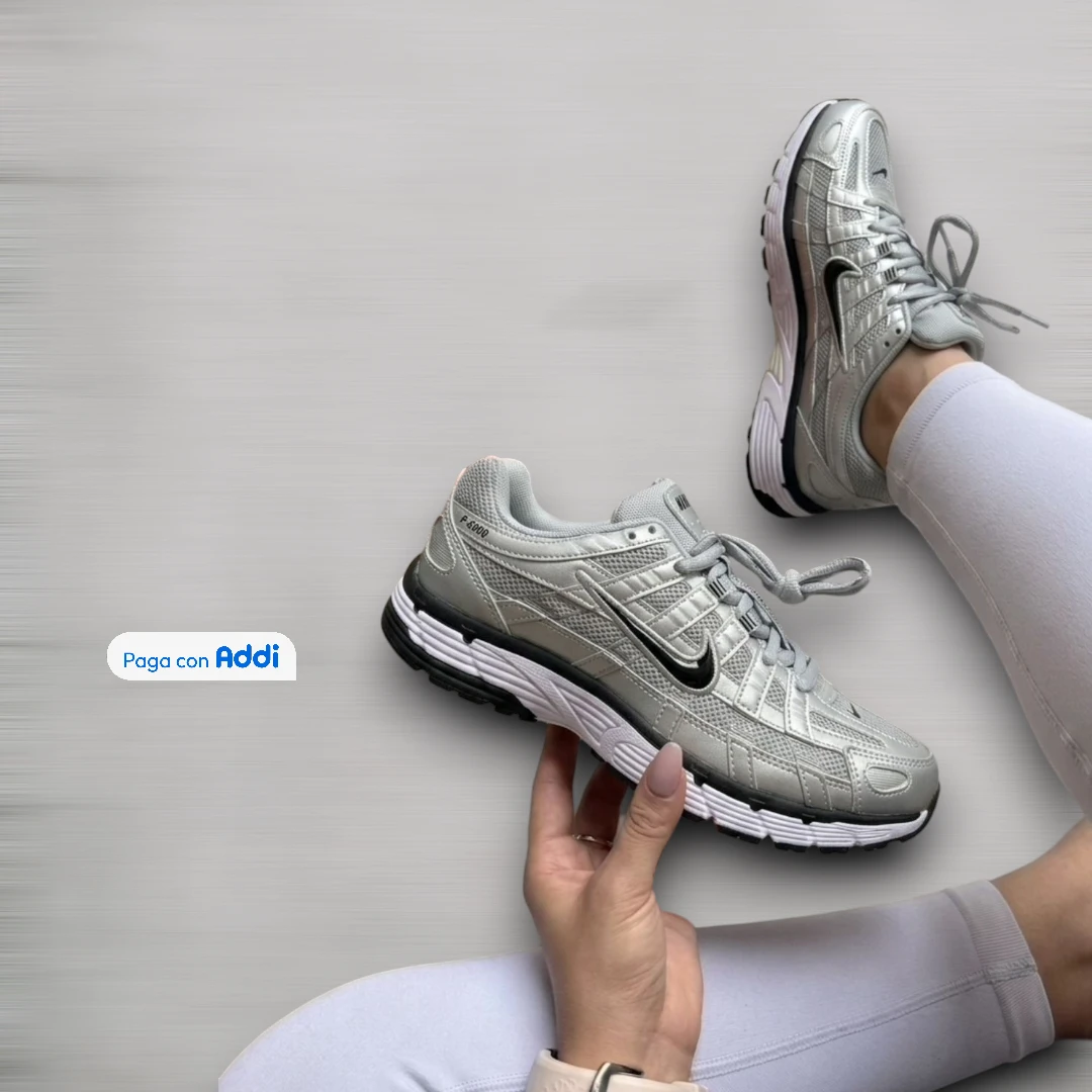 Tenis running Nike P6000 blanco con plateado para caminar con amortiguación y estilo urbano