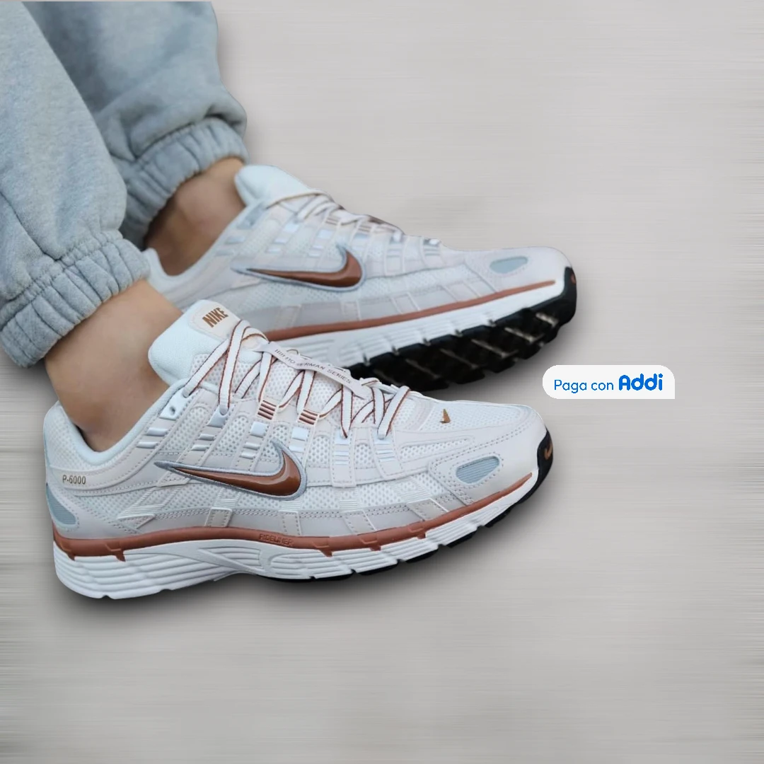 Tenis Nike P6000 blanco plateado rosa para mujer estilo running urbano con amortiguación cómoda