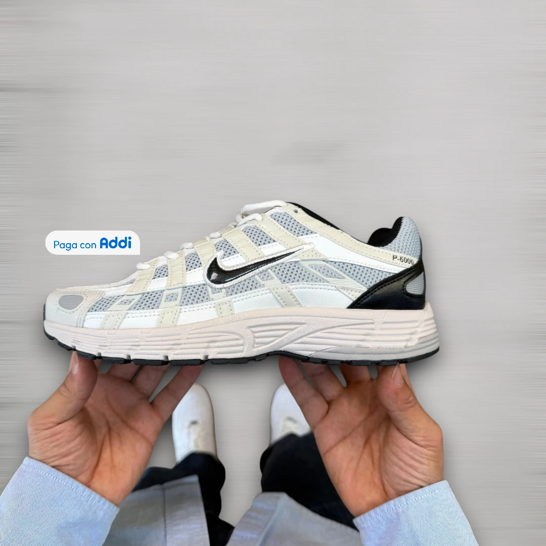 Tenis Nike P6000 blanco plateado negro estilo running urbano para uso diario con máxima comodidad