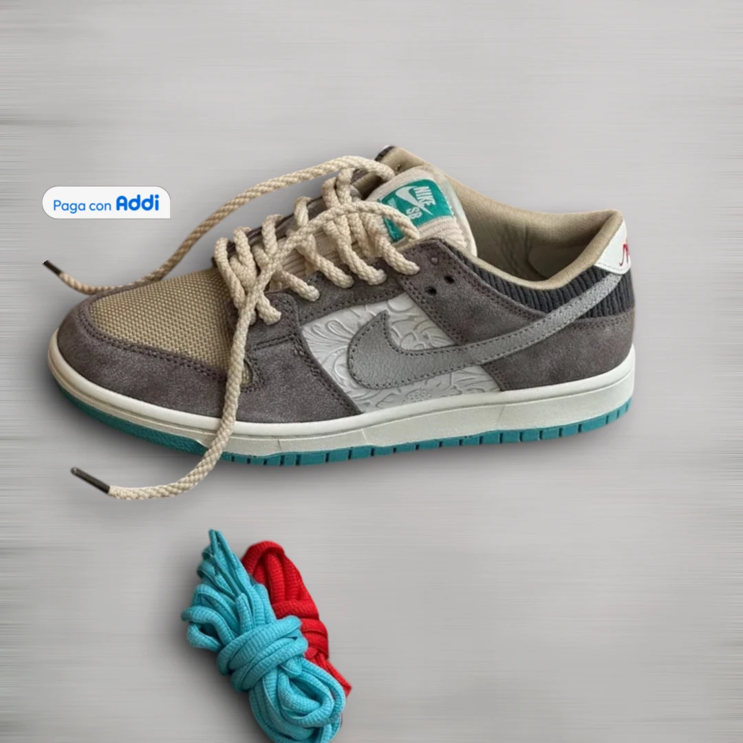 Tenis Nike SB blanco café de estilo skate casual, con tonos neutros, suela adherente y ajuste cómodo