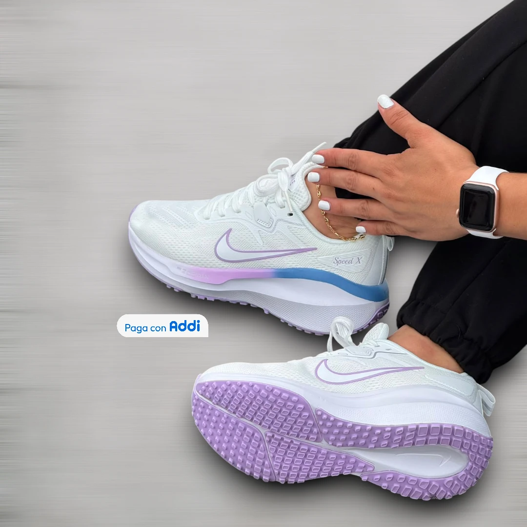 Tenis Nike Speed X mujer blanco morado azul para running con amortiguación reactiva y máximo confort