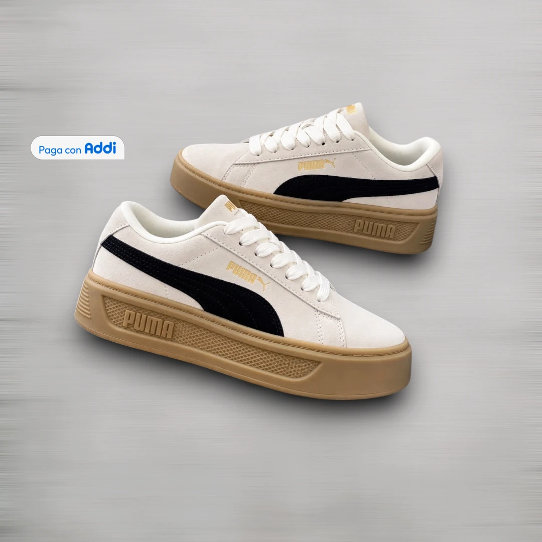 Tenis Puma Smash mujer beige negro de estética casual deportiva, con diseño atemporal, suela flexible y confort al caminar