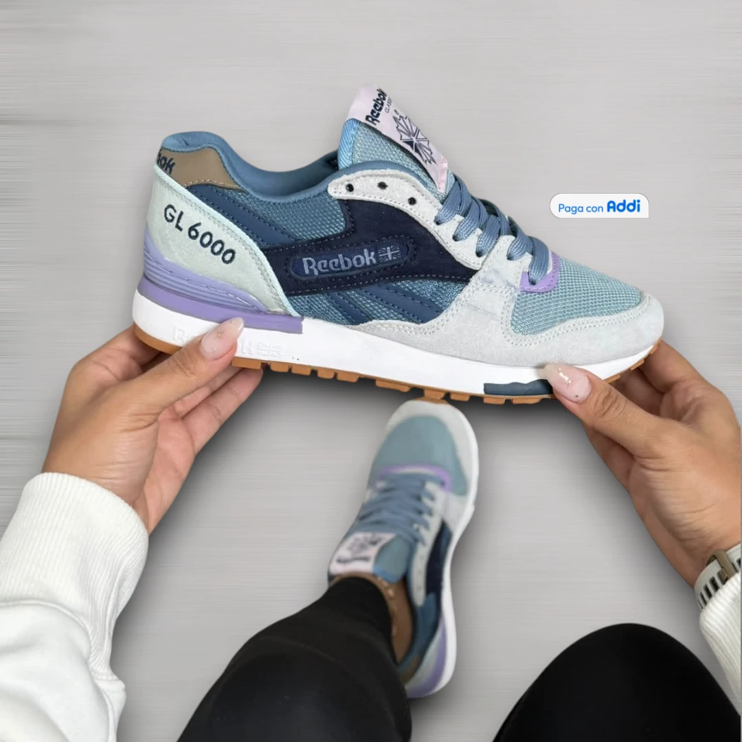 Tenis Reebok GL6000 mujer azul estilo retro running, con diseño deportivo vintage, amortiguación y comodidad para caminar
