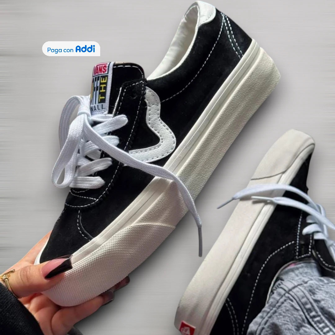 Tenis Vans unisex negro con blanco estilo skate urbano para caminar con suela cómoda y diseño casual